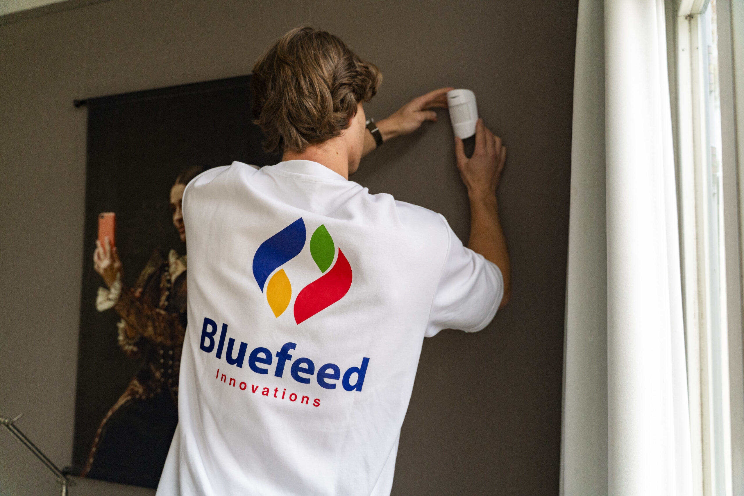 Installatie bewegingsmelder Ajax smart home security door Bluefeed installateur